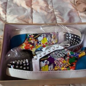 Men’s size 41 Christian Louboutin sneaker.